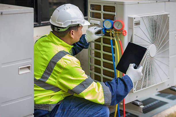 Professional Hvac technician working in Ball Ground, GA
